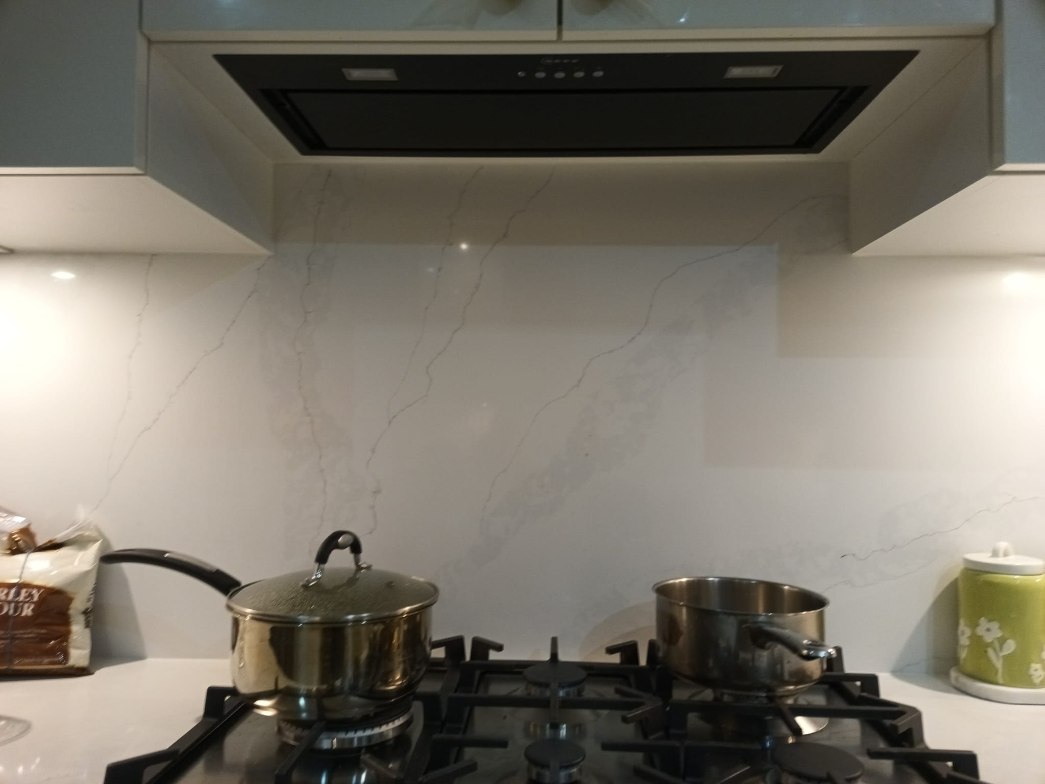 Gas Cooktop with Marble Backsplash